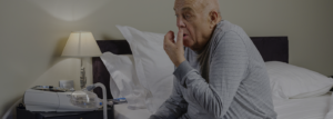 COPD-man-sitting-coughing-non-invasive-ventilation-desktop