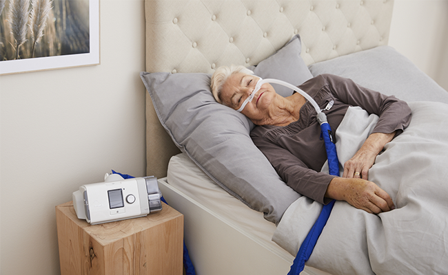 COPD-woman-sleeping-high-flow-therapy-mobile