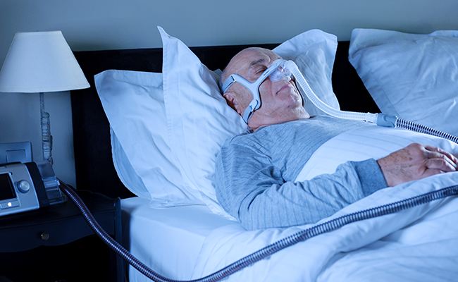 Lumis_COPD_patient_bed_sleeping_nasal_mask
