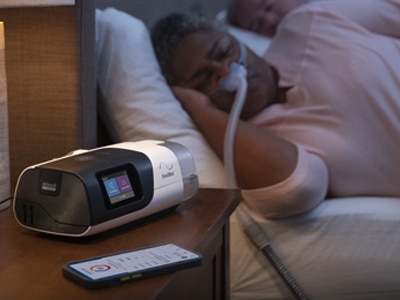ResMed-sleep-apnoea-patient-sleeping-nasal-mask-CPAP-device-myair-app