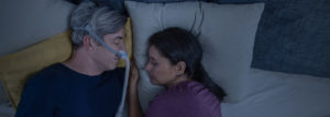 man-sleeping-with-AirFit-N30-CPAP-mask-close-to-his-wife