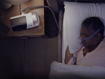 sleep-apnea-patient-sleeping-with-AirSense-11-CPAP
